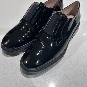 Stuart Weitzman black patent leather loafers